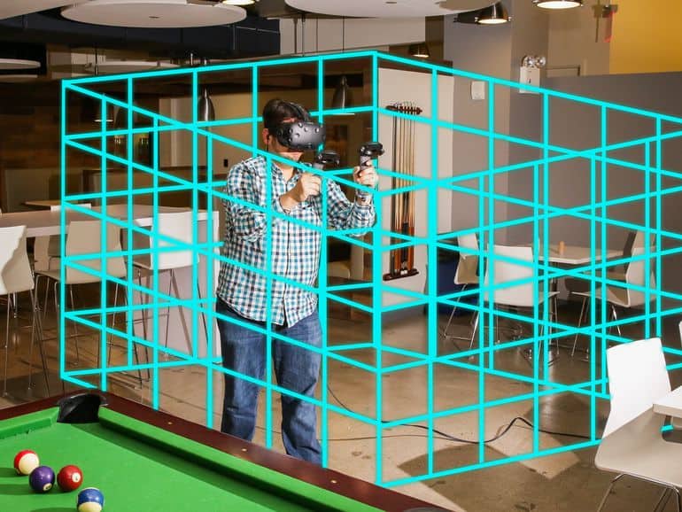 HTC Vive Room Scale Layout throws up a virtual blue grid to keep you in the preset boundaries of an immersive experience