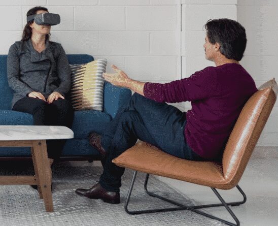 A therapist using Virtual Reality Exposure Therapy